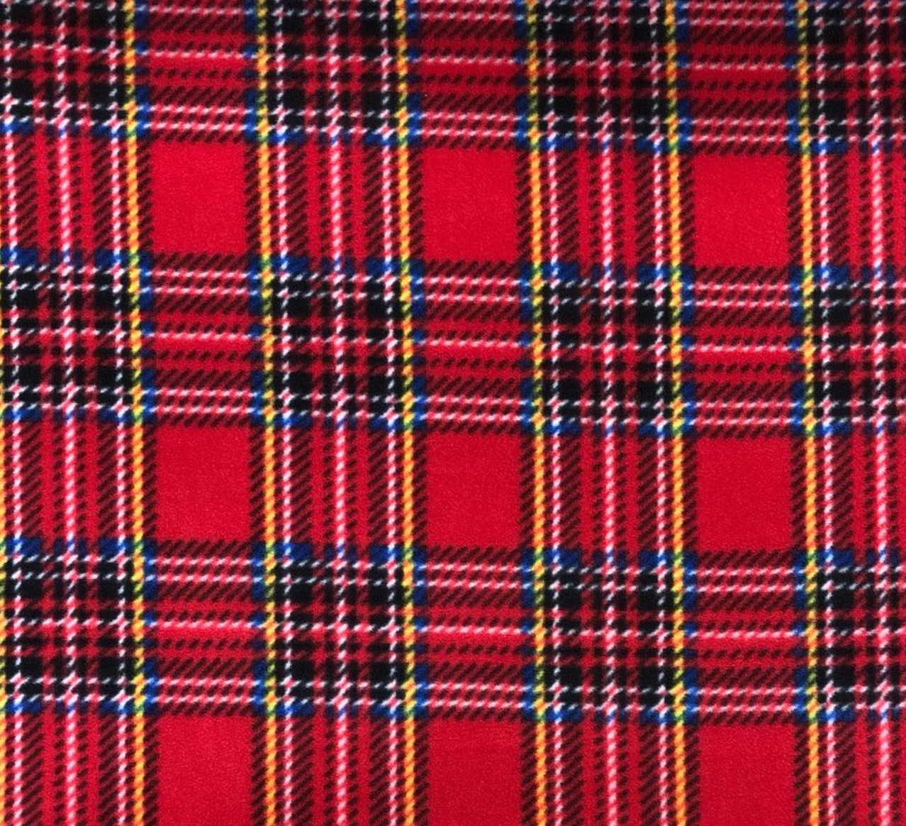 Close-up of red plaid fabric with a pattern of intersecting lines.