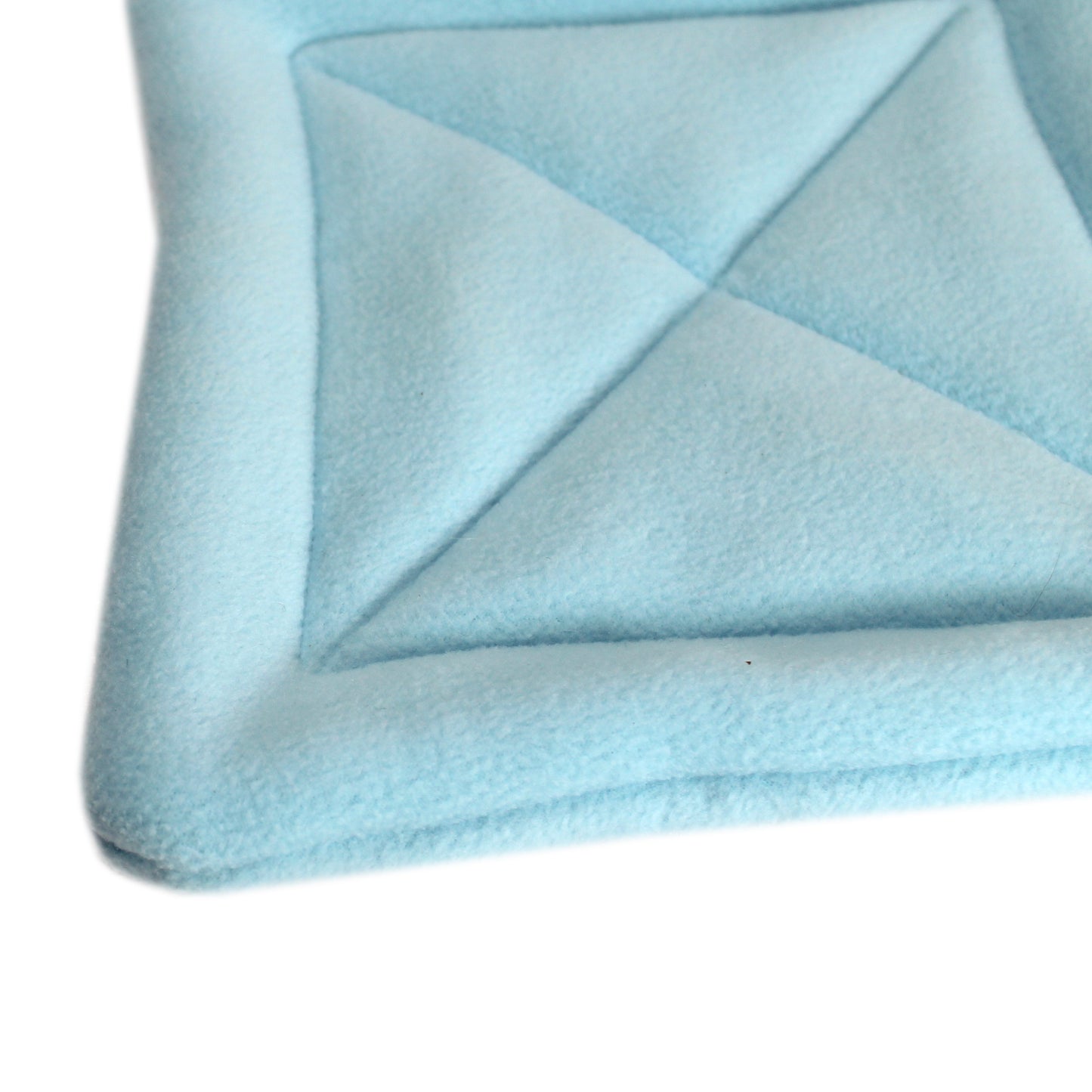Blue Patchwork Hidey House For Guinea Pig, close up view of the pee pad
