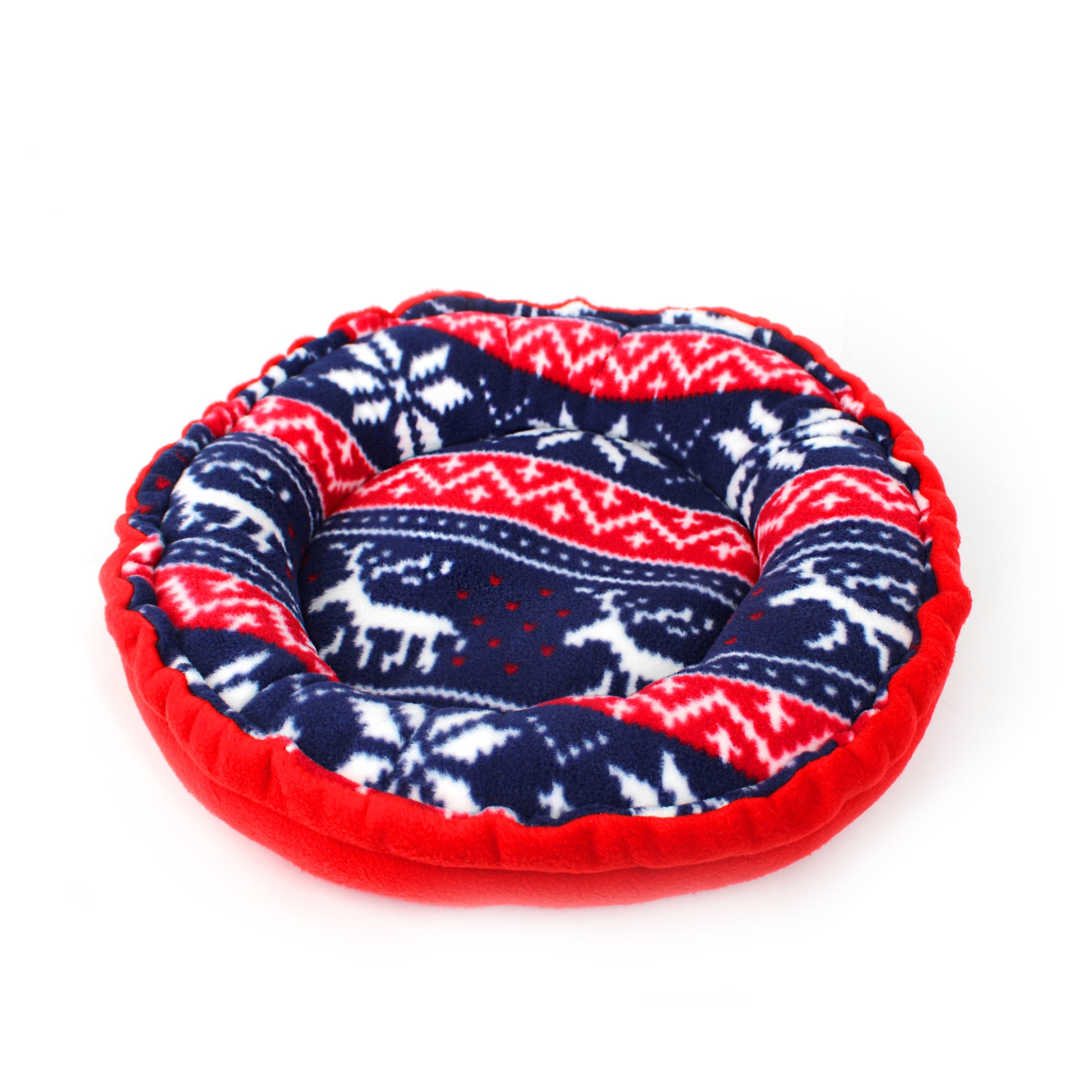 Round cushion bed with red, blue, and white pattern on a white background