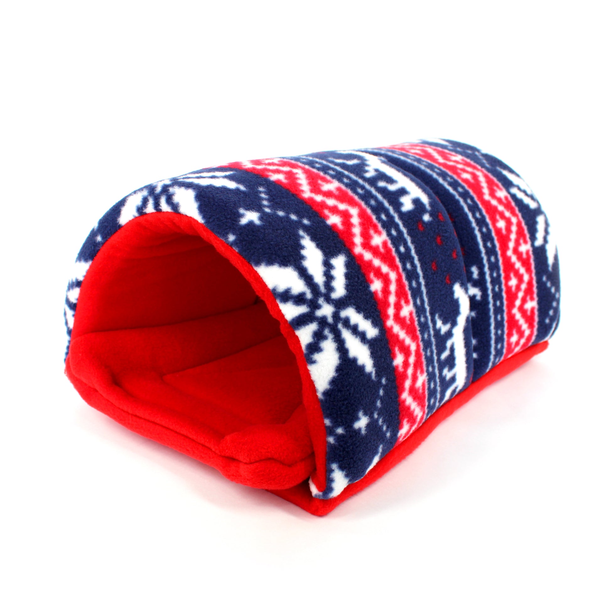 Pet bed with red interior and blue patterned exterior on a white background