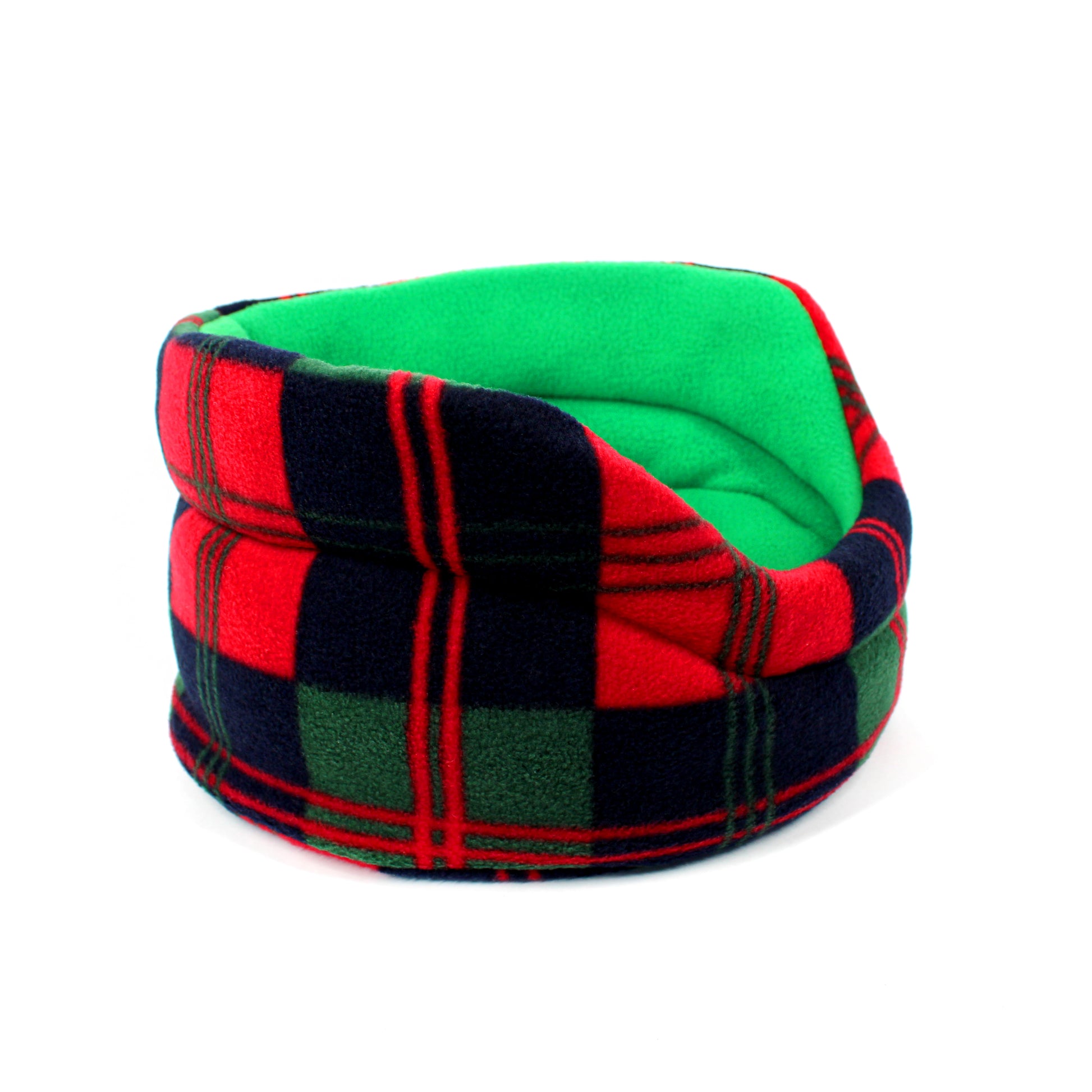 Plaid patterned pet bed with green, red, and black colors on a white background