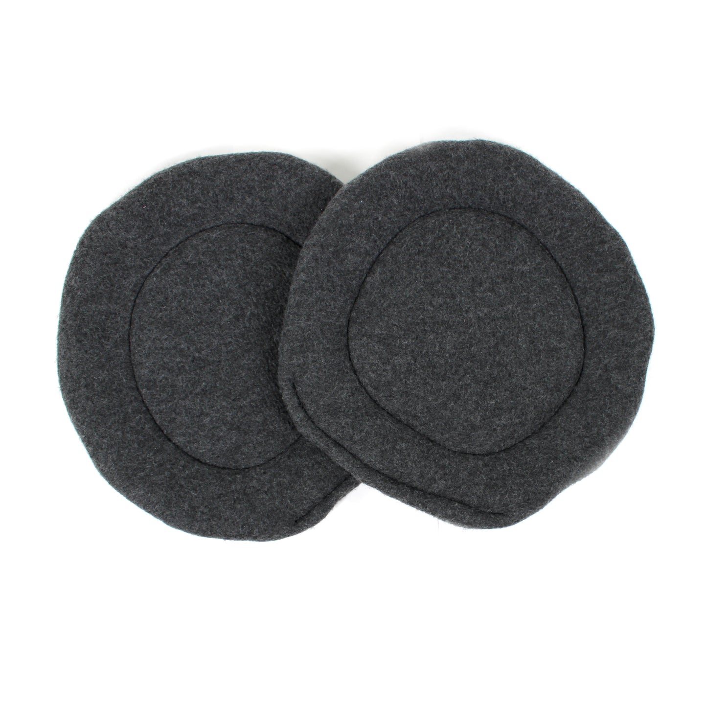 Two gray fleece pee pads on a white background