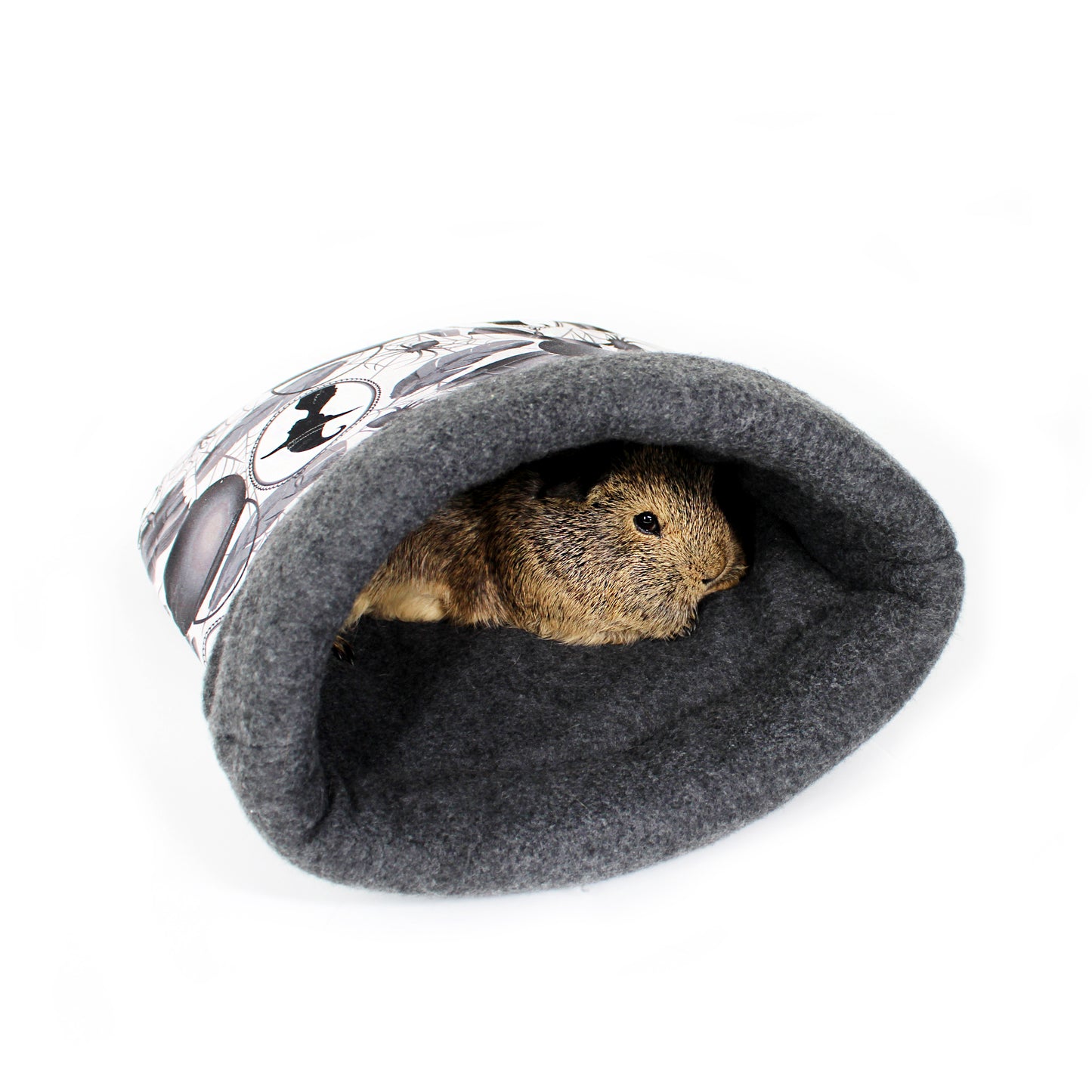 Small animal peeking out from a gray felted pet cave with a white background