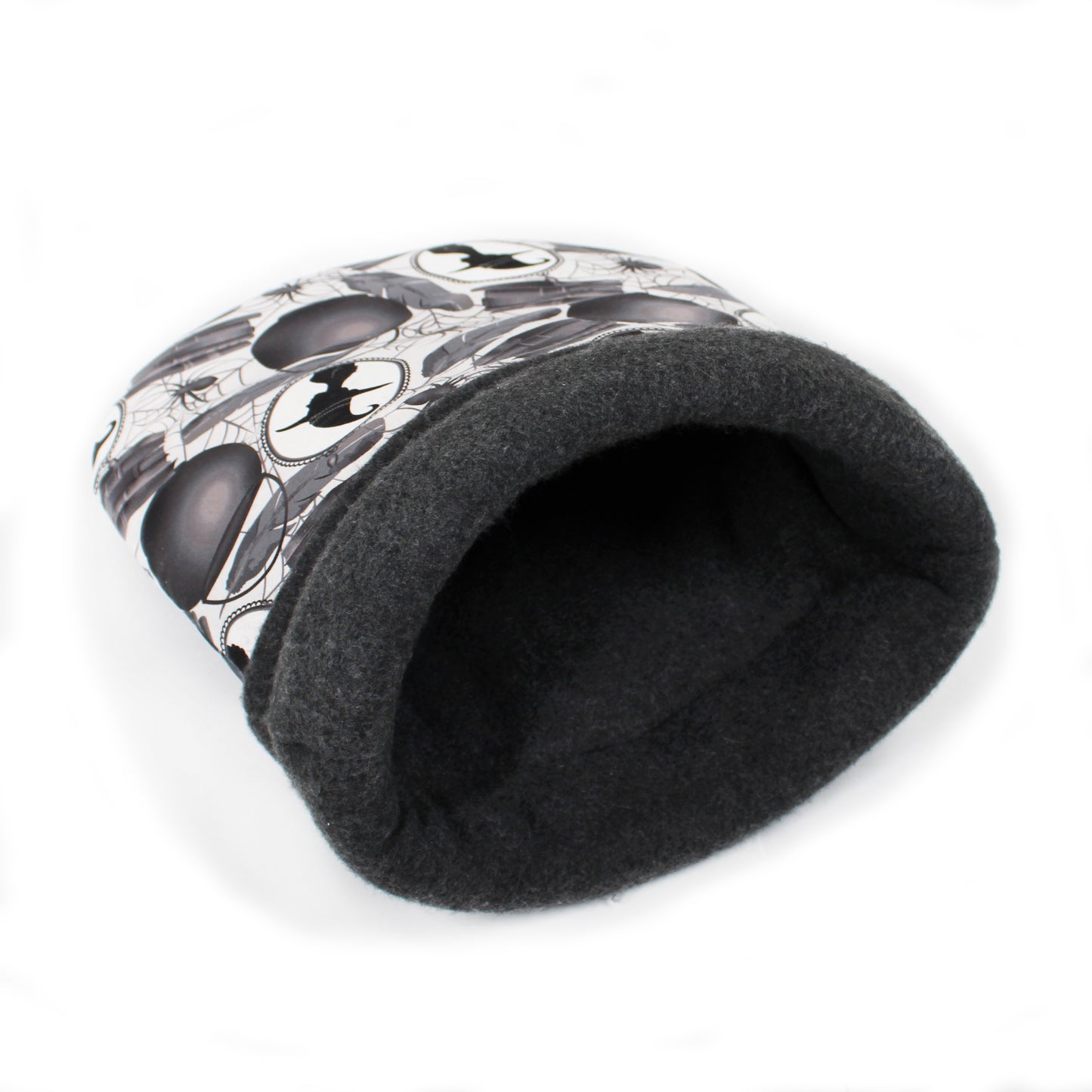 Black pet bed with white pattern on a white background