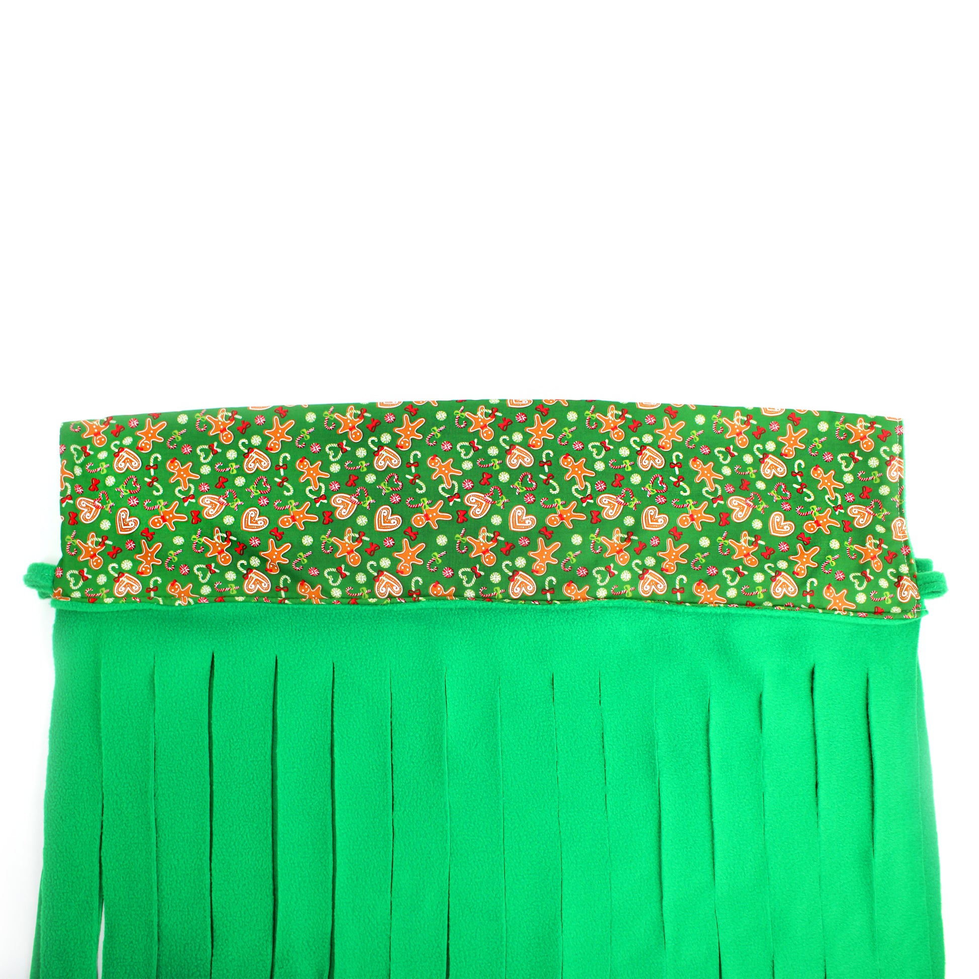 Green fabric with a festive pattern on a white background