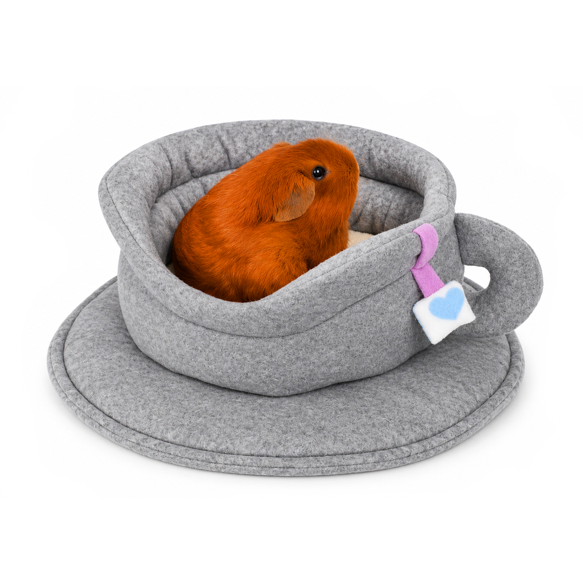 Grey fleece teacup bed for guinea pigs with guinea pig relaxing inside