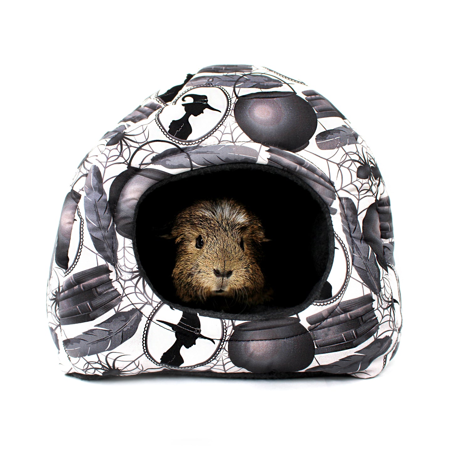 Small animal house with Halloween-themed design featuring a guinea pig inside on a white background