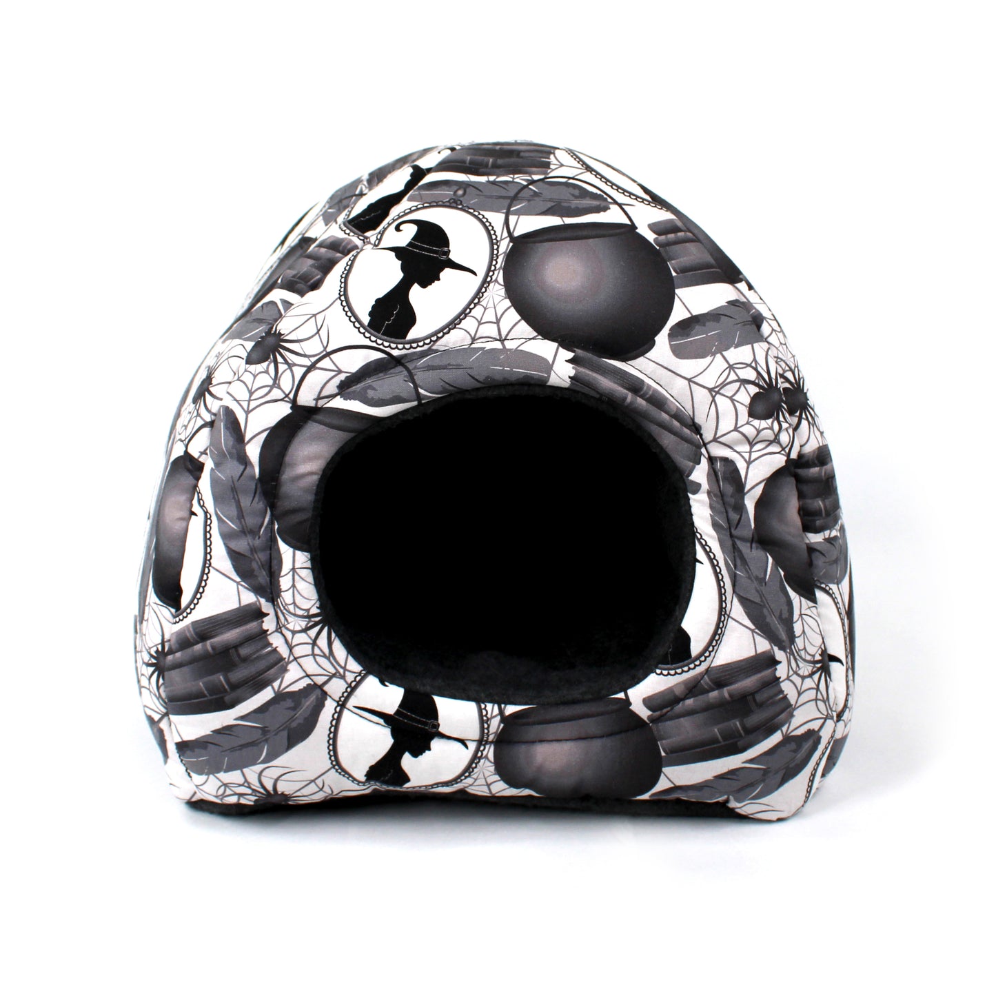 Black and white patterned pet bed with spider webs and penguins on a white background