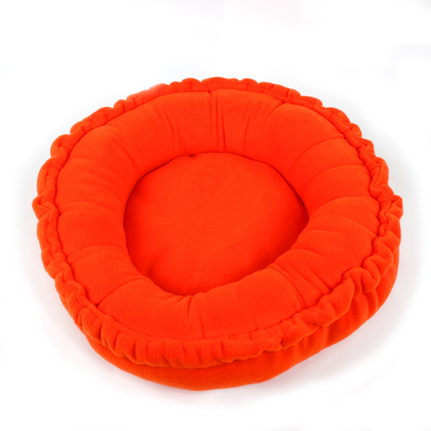 Orange pet bed on a white background