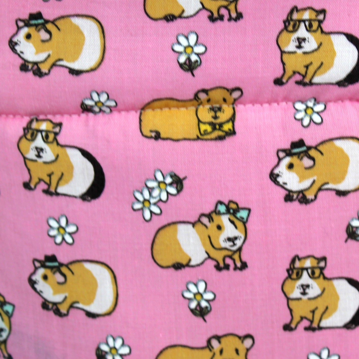 Pink Guinea Pig Pattern Bed for Guinea Pigs, close up of the guinea pig pattern fabric