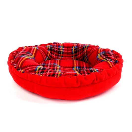 Red pet bed with plaid pattern on a white background