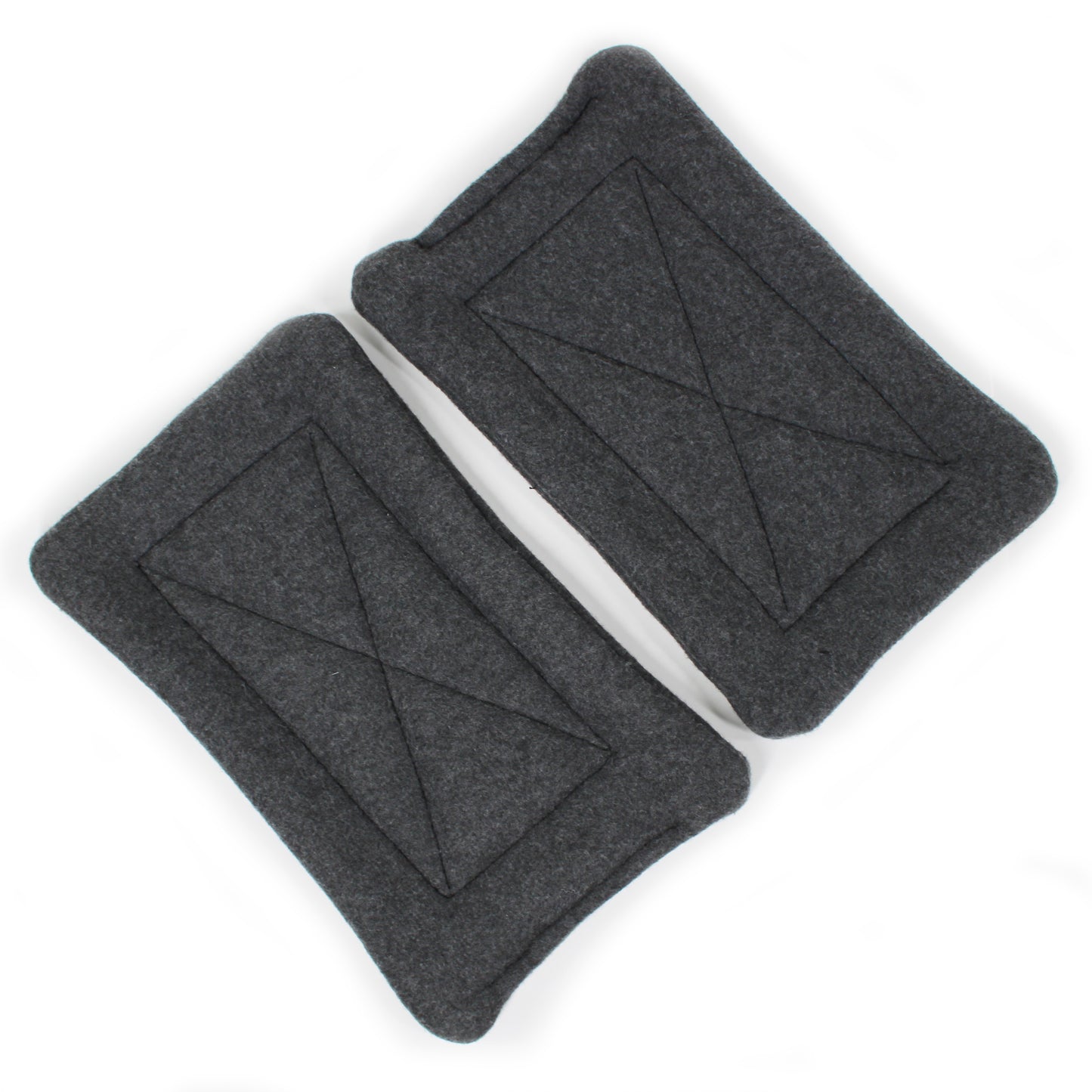 Two gray fleece pee pads with geometric design on a white background