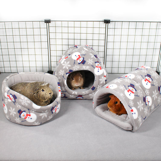 Three gray pet houses with snowman pattern on a white background
