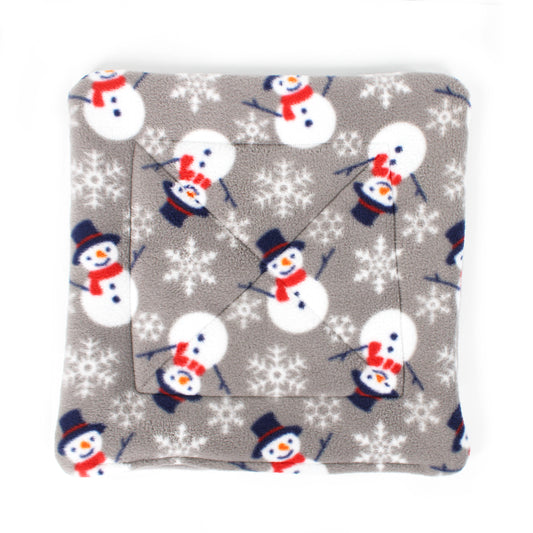 Plush blanket with snowman pattern on a gray background