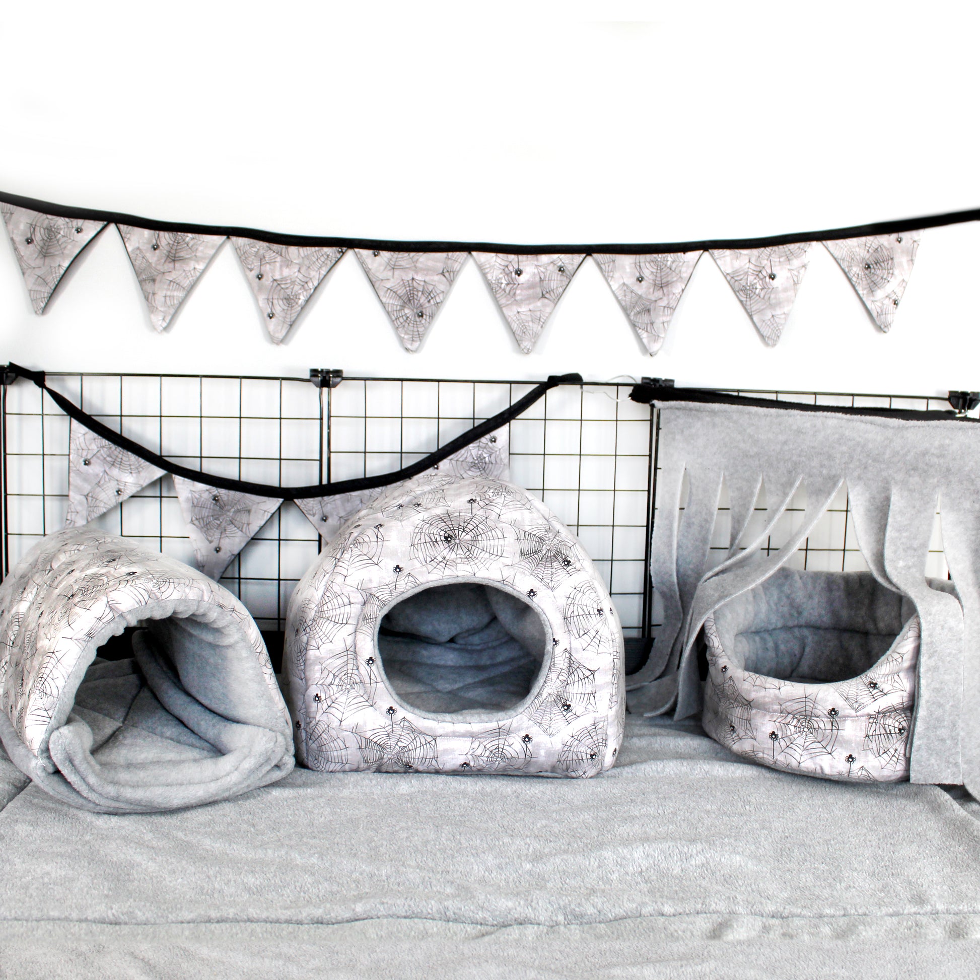 Halloween spider fleece guinea pig accessories, example of what a cage with all the accessories would look like