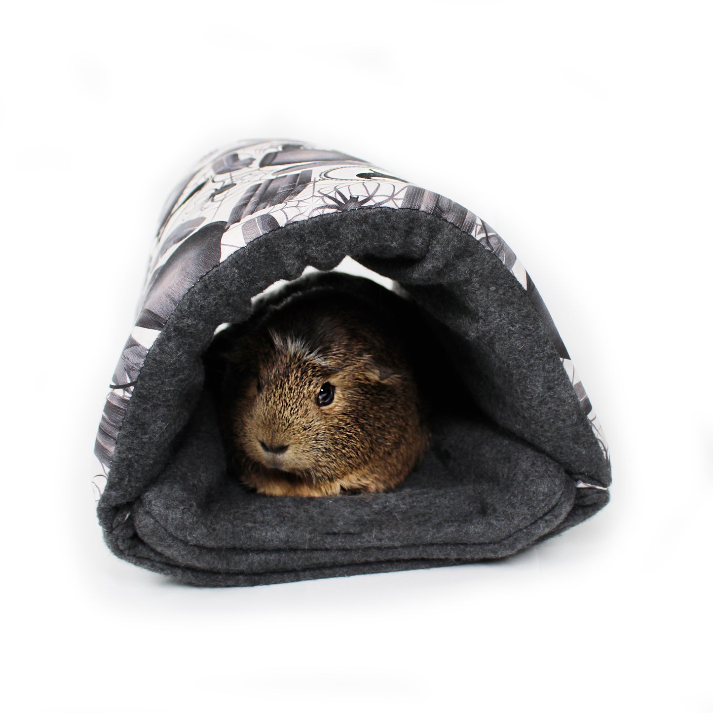 Small animal peeking out from a gray pet tent with a black and white patterned top on a white background
