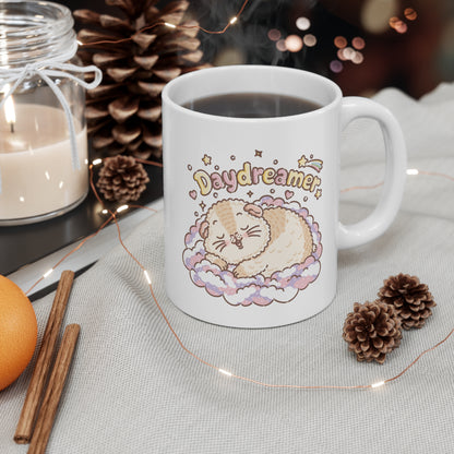 Halloumi Daydreamer guinea pig mug on a cosy coffee table