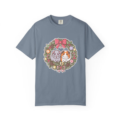 Blue-grey Christmas guinea pig T-shirt with Earl Grey and Teacake wreath artwork.