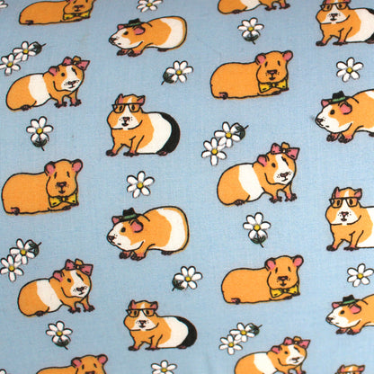 Blue Guinea Pig Pattern Hidey Hut, clouse up of the cotton guinea pig pattern fabric