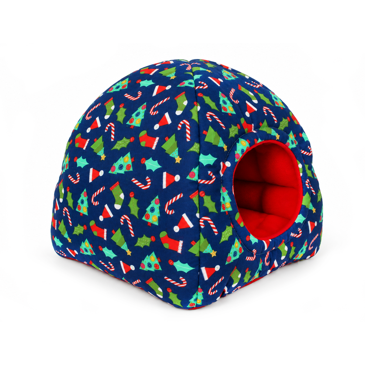 Side view of a handmade blue Christmas hidey house for guinea pigs showing the colourful festive print and circular entrance