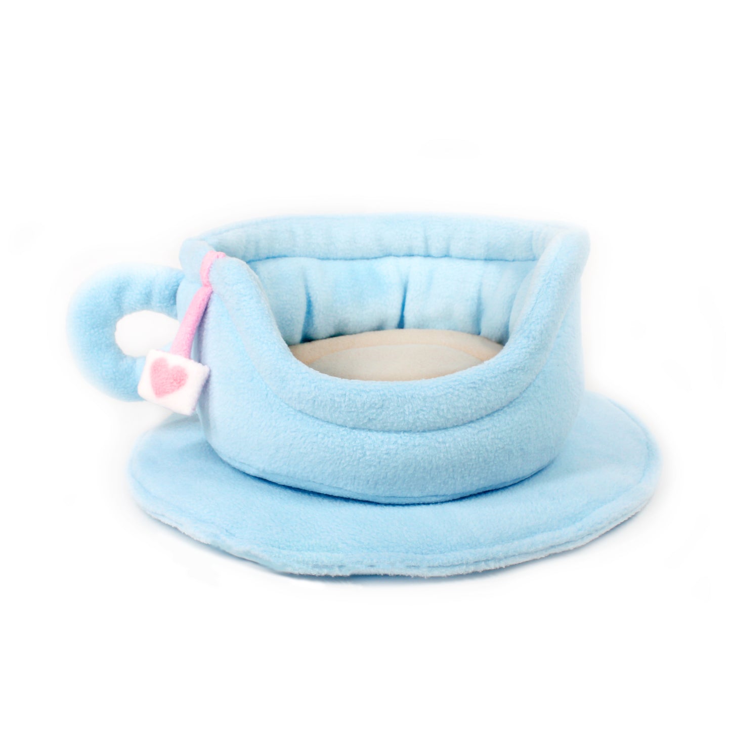 Light blue pet bed with a pink heart tag on a white background