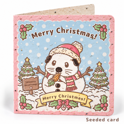 Seeded Christmas guinea pig card featuring Swiss Roll the guinea pig dressed as a snowman