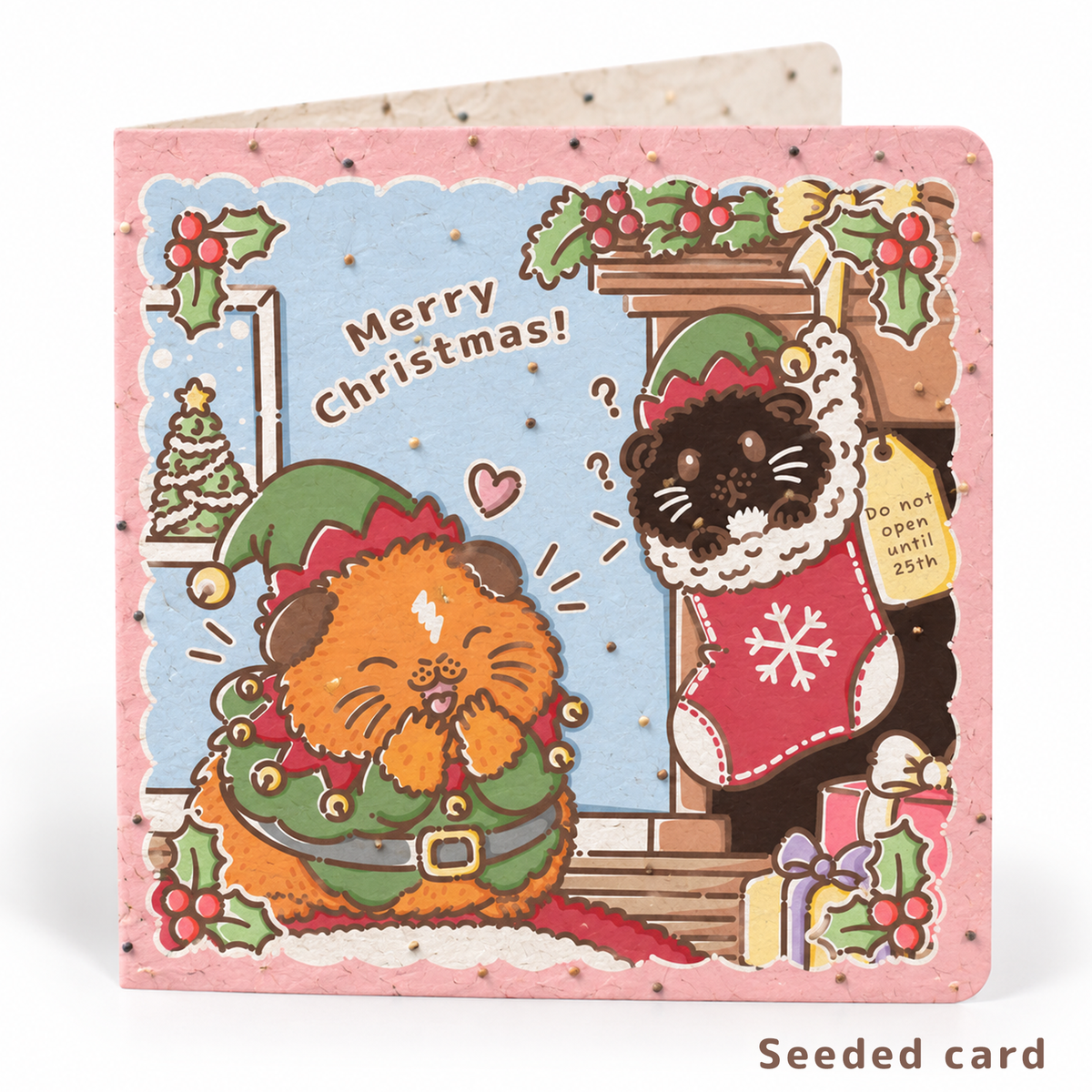 Seeded Christmas guinea pig card featuring Toffee Apple dressed as Santa and Blackjack in a Christmas stocking, with visible seeds in the paper