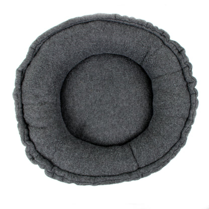 Gray donut bed on a white background