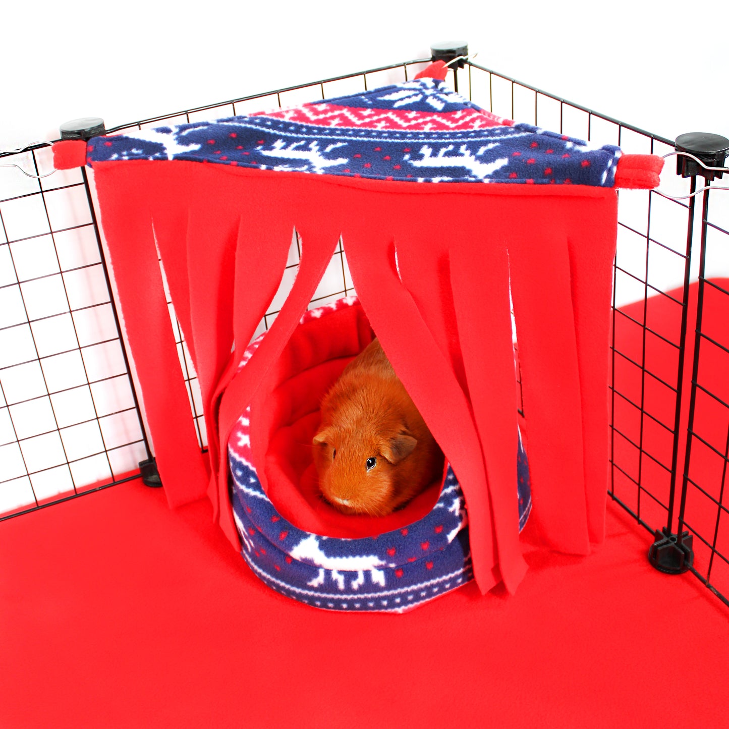 Pet playpen with red and blue fabric, featuring a small animal inside.