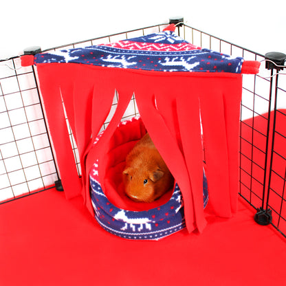 Pet playpen with red and blue fabric, featuring a small animal inside.