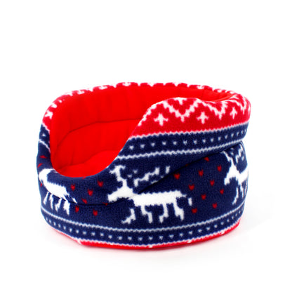 small animal bed with reindeer pattern on a white background