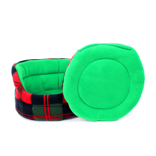 Green pet bed with plaid pattern on a white background
