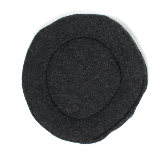 Dark gray pee pad on a white background