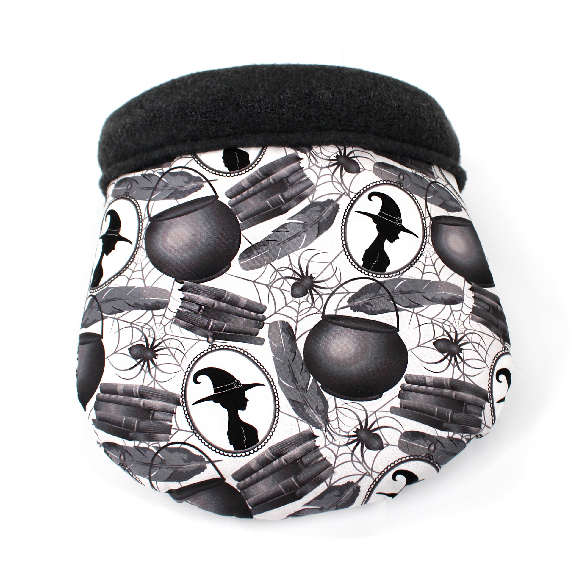 cuddle sack with a Halloween-themed pattern featuring witches, cauldrons, and books on a white background.