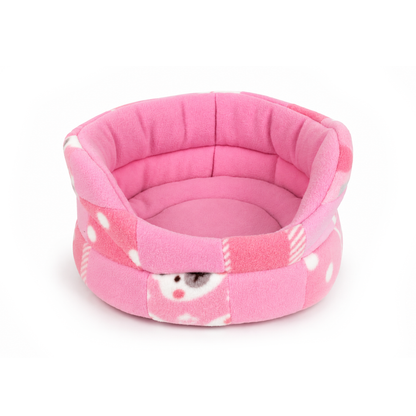 Cute pink patchwork cuddle cup bed for guinea pigs with soft fleece sides
