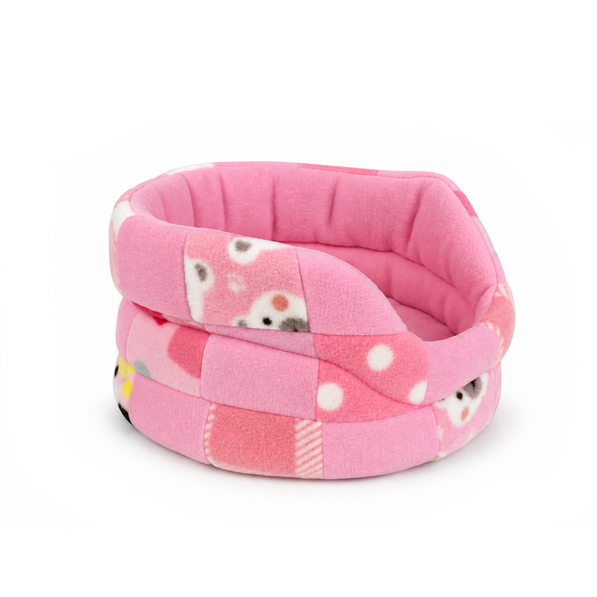 Pink patchwork fleece cuddle cup bed for guinea pigs showing patterned fabric