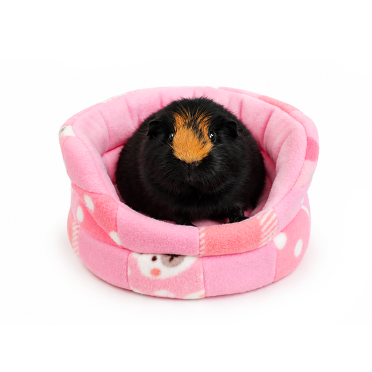 Cute pink patchwork cuddle cup bed for guinea pigs with guinea pig inside