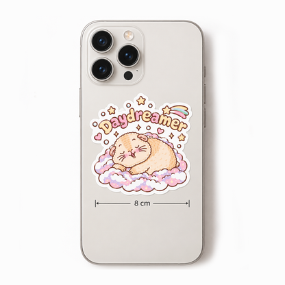 Halloumi the Daydreamer guinea pig sticker on a phone case