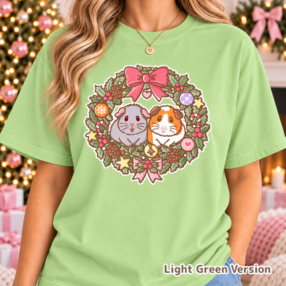 Model wearing the Light Green T-shirt featuring Earl Grey and Teacake's Christmas wreath.