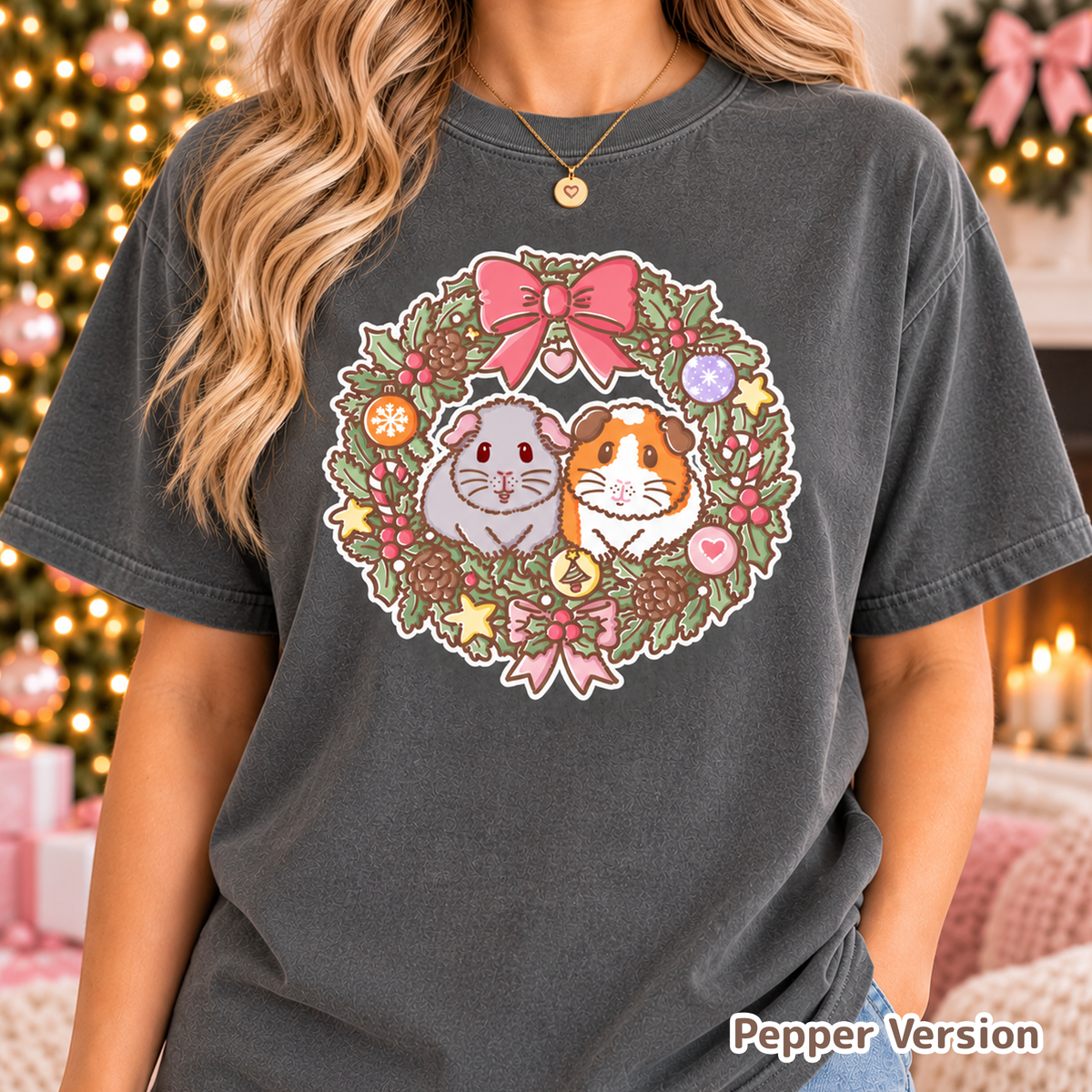 Model wearing the dark Pepper T-shirt with the colourful Christmas wreath print.