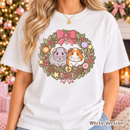 Model wearing the white Christmas guinea pig wreath T-shirt.