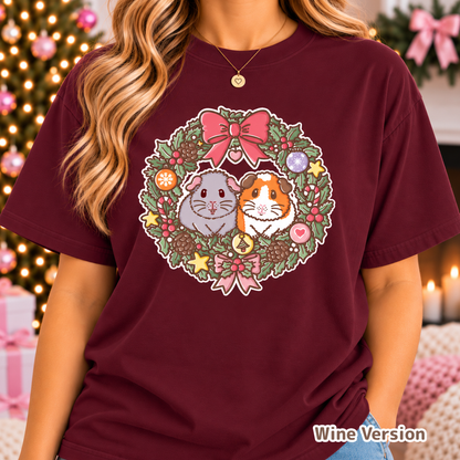 Model wearing the Wine-coloured Christmas guinea pig wreath T-shirt.
