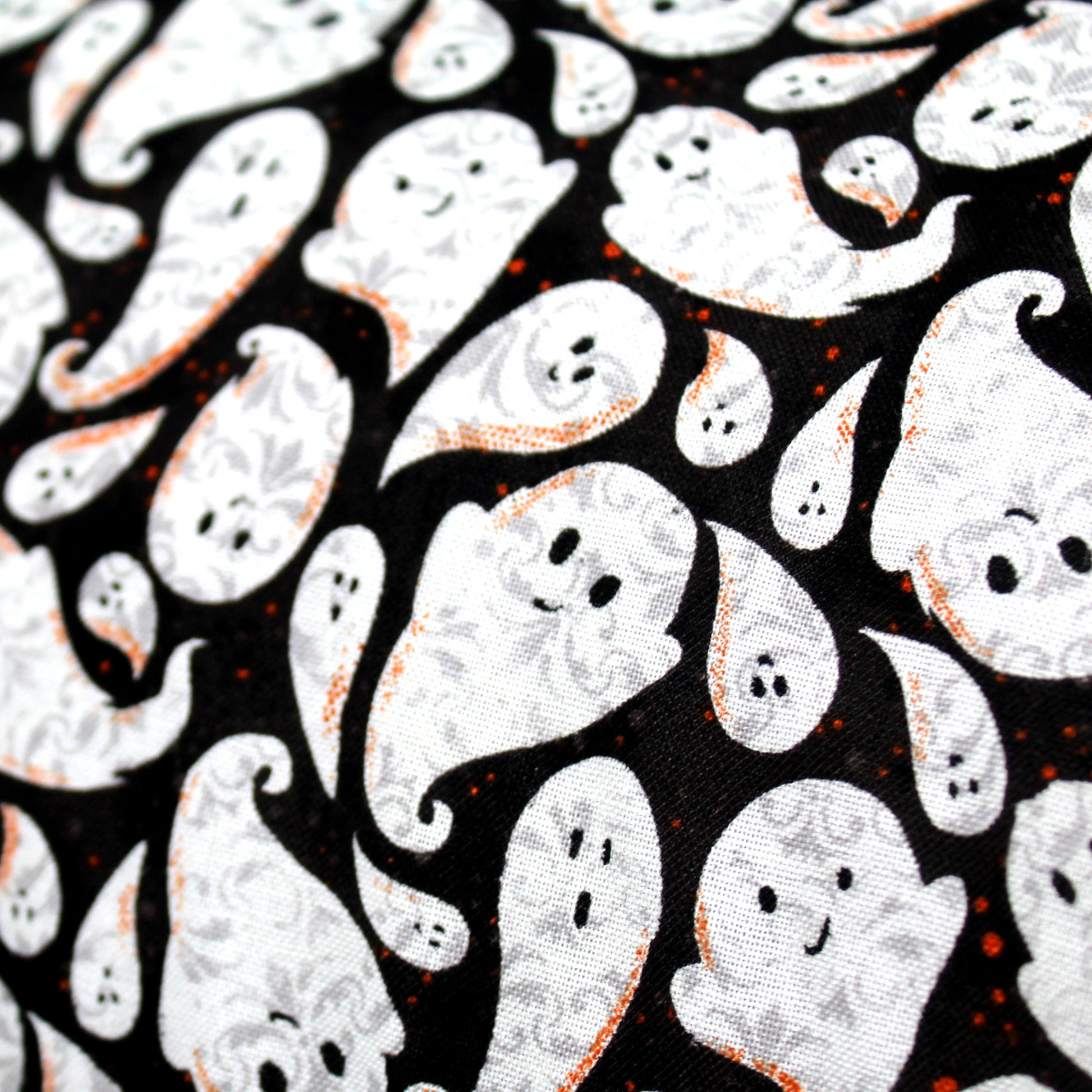 Halloween Ghost Material, Close up view of the cotton fabric showing the spooky ghost pattern