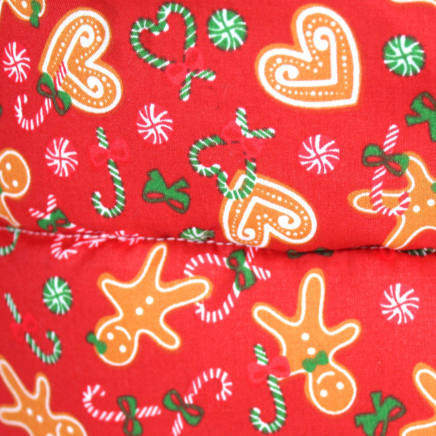 Red Gingerbread Guinea Pig Cuddle Cup, close up view of the gingerbread pattern fabric