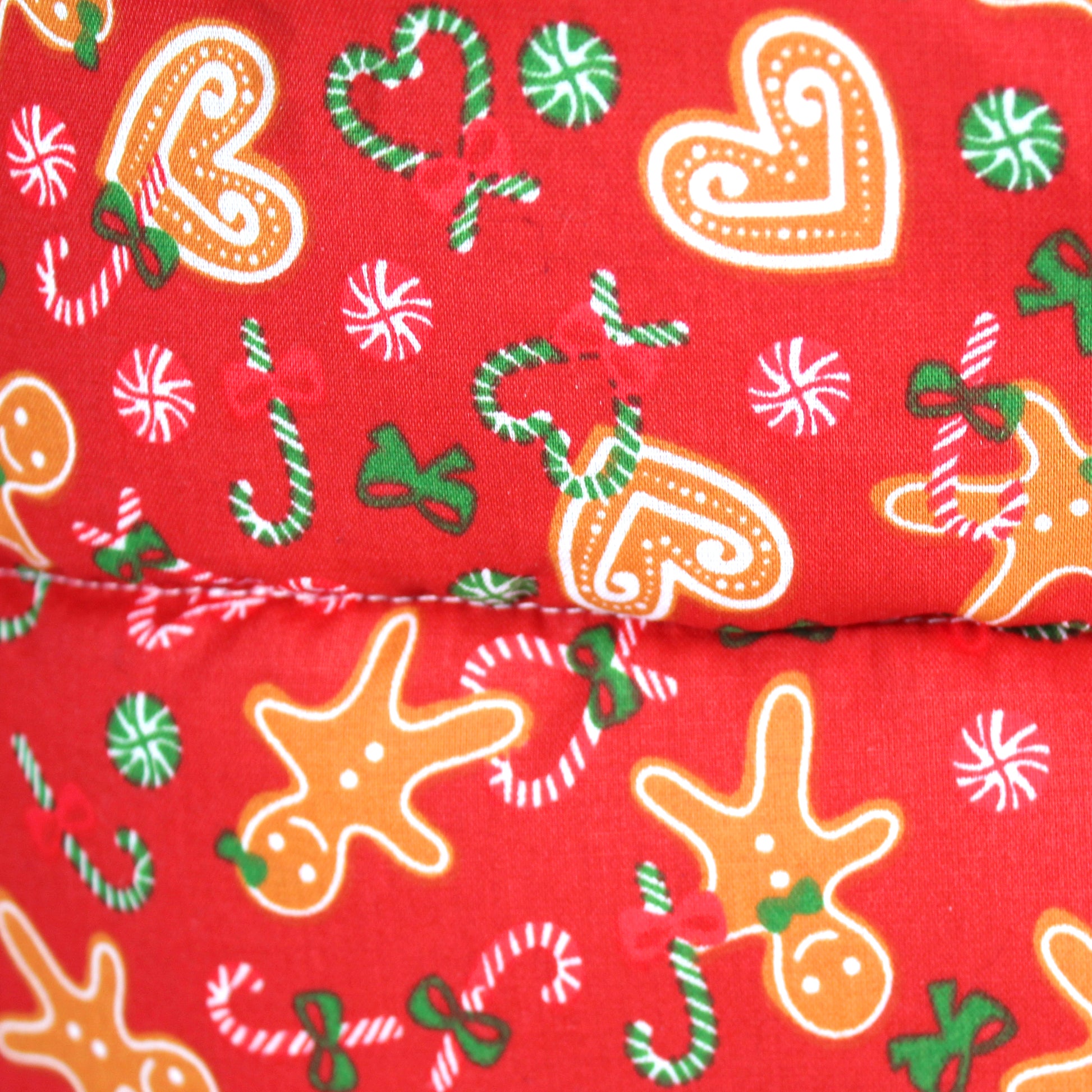 Red Gingerbread Guinea Pig Cuddle Cup, close up view of the gingerbread pattern fabric