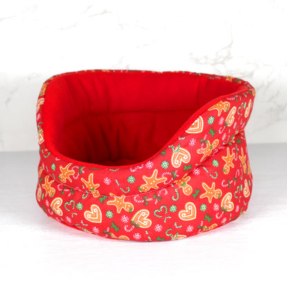 Red Gingerbread Guinea Pig Cuddle Cup, side view of the empty guinea pig bed