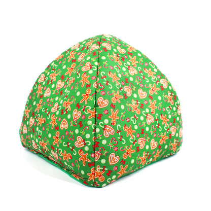 Green fabric play tent with gingerbread man pattern on a white background