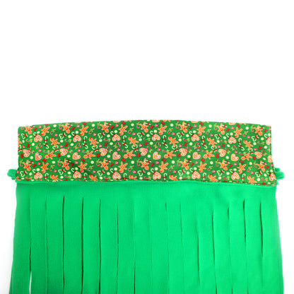 Green fabric with a festive pattern on a white background