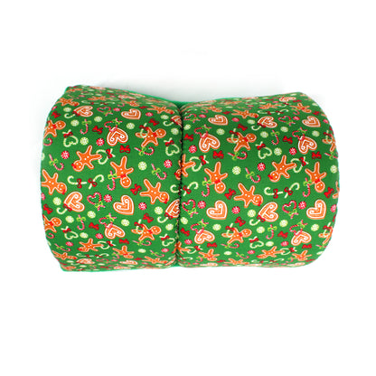 Green Foam Tunnel for guinea pigs with festive gingerbread pattern on a white background
