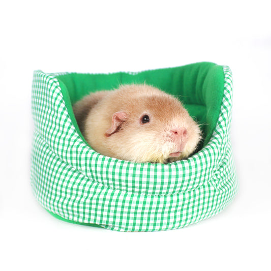 Emerald Green Gingham Cuddle Cup Bed, close up view with a guinea pig snuggled inside the cuddle cup bed
